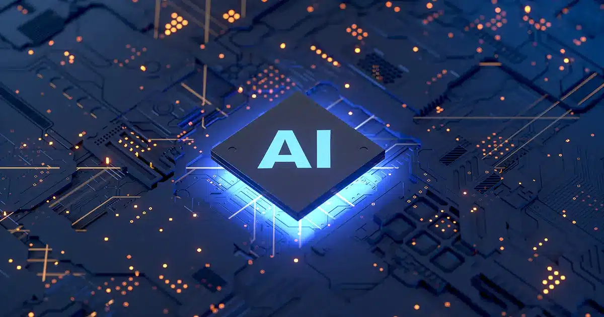 A computer chip labeled "AI" on a glowing circuit board.