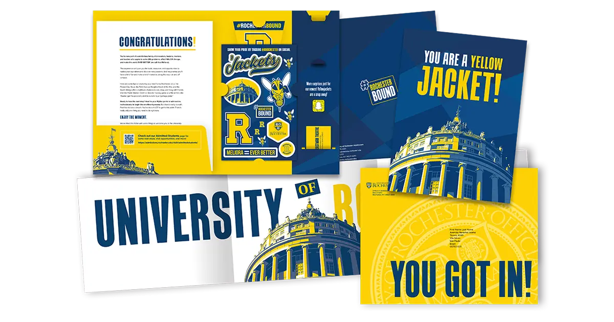 An assortment of print materials included in University of Rochester acceptance packet.